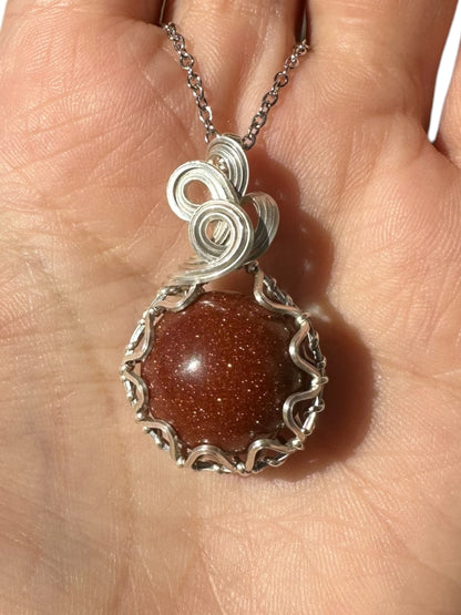 Sterling Silver Wire Wrapped Goldstone Crystal Fidget Bezel Pendant